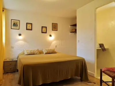 Un ou plusieurs lits dans un hébergement de l'établissement Holiday Home Weingut Punta della guardia zwischen Meer und Gebirge by Interhome