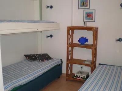 Un ou plusieurs lits dans un hébergement de l'établissement Apartment Pont de bateau- Meerblick mit privatem Pool by Interhome