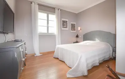 Un ou plusieurs lits dans un hébergement de l'établissement Beautiful Home In Saint Florent