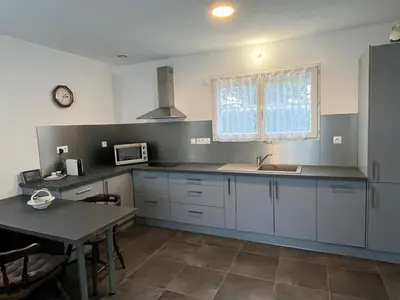 Cuisine ou kitchenette dans l'établissement Maison