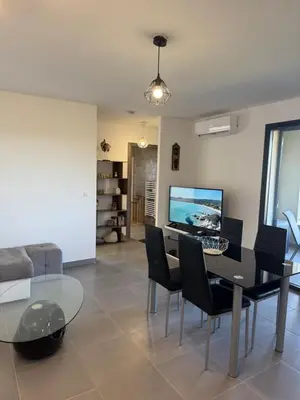Télévision ou salle de divertissement dans l'établissement L'Immortelle - T3 avec balcon vue mer & montagne