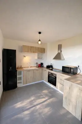 Cuisine ou kitchenette dans l'établissement L'Immortelle - T3 avec balcon vue mer & montagne