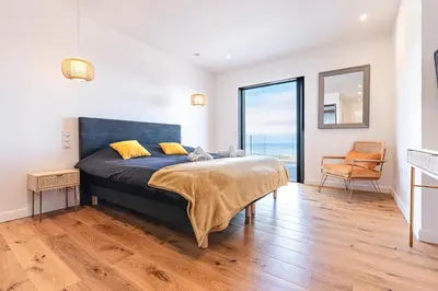 Un ou plusieurs lits dans un hébergement de l'établissement Villa Evasione - Climatisée piscine vue mer