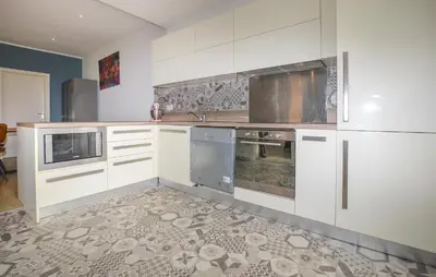 Cuisine ou kitchenette dans l'établissement Villa Piscine Privative