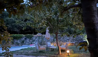 Jardin de l'établissement Suite avec jardin et piscine