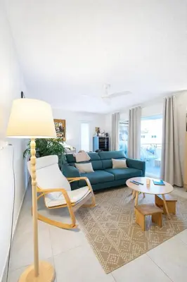 Coin salon dans l'établissement Appartement CALVI lumineux avec terrasse
