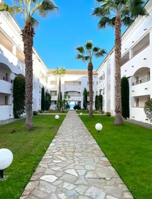 Jardin de l'établissement Appartement en bord de mer