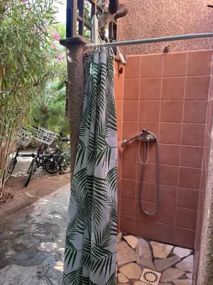 Salle de bains dans l'établissement Maison face à la mer