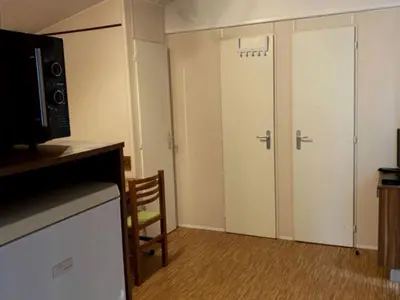 Plan de l'établissement Mobil Home avec Terrasse, 2 Chambres, 4 Pers. - API-1-52-840