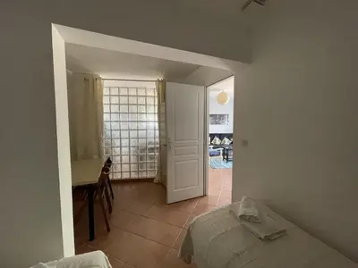 Un ou plusieurs lits dans un hébergement de l'établissement T3 de 80m2 avec piscine - jardin - vue mer