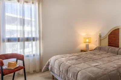 Un ou plusieurs lits dans un hébergement de l'établissement Casa Catalina Charme contemporain à lÎle-Rousse