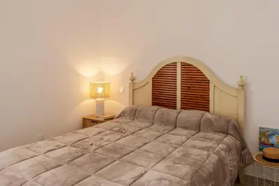 Un ou plusieurs lits dans un hébergement de l'établissement Casa Catalina Charme contemporain à lÎle-Rousse