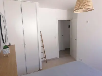 Un ou plusieurs lits dans un hébergement de l'établissement Petit havre de paix au bord de la mer