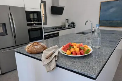 Cuisine ou kitchenette dans l'établissement Villa MARINE