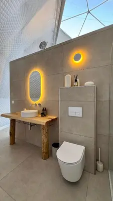 Salle de bains dans l'établissement Les Dômes du Moulin