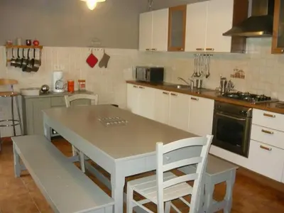 Cuisine ou kitchenette dans l'établissement Holiday Home Exklusivität Korsika- Steinhaus mit Charme by Interhome