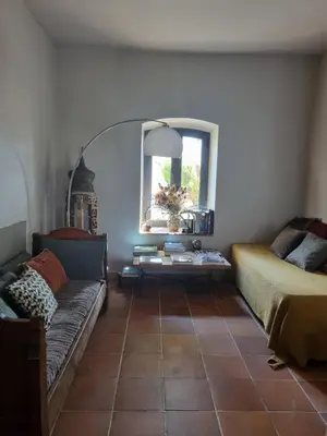 Coin salon dans l'établissement Ferme Canioni