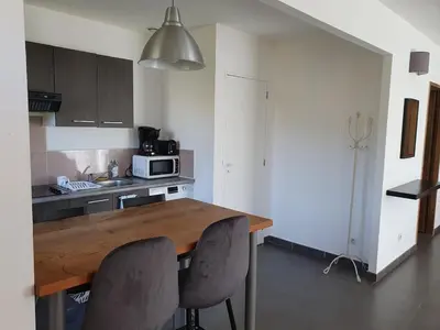 Cuisine ou kitchenette dans l'établissement maison être mer et montagne