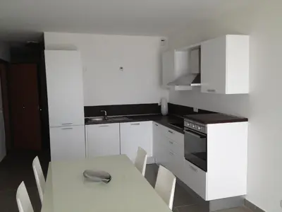 Cuisine ou kitchenette dans l'établissement Résidence Villa Tyrrenia