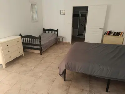 Un ou plusieurs lits dans un hébergement de l'établissement Appartement avec terrasse vue sur mer