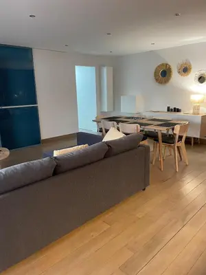 Coin salon dans l'établissement Appartement avec grande terrasse