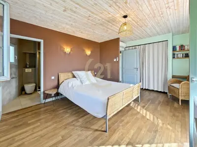 Un ou plusieurs lits dans un hébergement de l'établissement Villa T4 vue mer, piscine & jardin - Corbara
