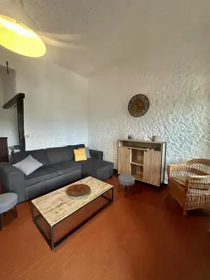 Coin salon dans l'établissement Appartement à Monticello