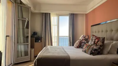 Un ou plusieurs lits dans un hébergement de l'établissement Hôtel Des Gouverneurs