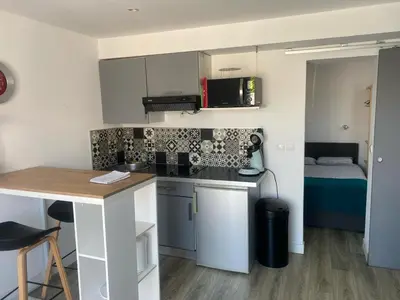 Cuisine ou kitchenette dans l'établissement T2 Campo Meta