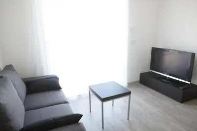 Télévision ou salle de divertissement dans l'établissement T2 Campo Meta