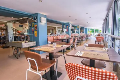 Restaurant ou autre lieu de restauration dans l'établissement Belambra Clubs Belgodère - Golfe de Lozari