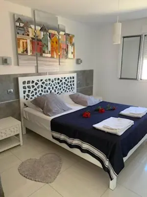Un ou plusieurs lits dans un hébergement de l'établissement appartement vue mer montagnes et citadelle casa di a murza Calvi