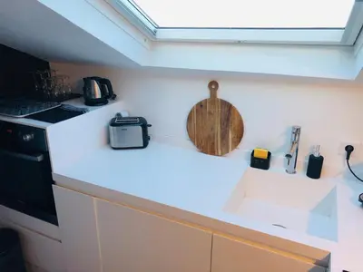 Cuisine ou kitchenette dans l'établissement Appartement Casaluna - Casadibastia - Vue mer Citadelle
