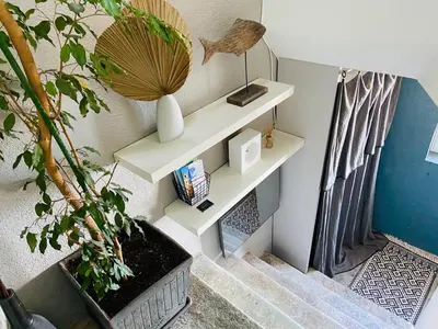 Télévision ou salle de divertissement dans l'établissement Appartement Casaluna - Casadibastia - Vue mer Citadelle