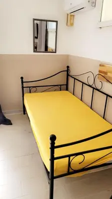 Un ou plusieurs lits dans un hébergement de l'établissement Berbi Rosse