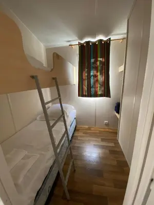 Un ou plusieurs lits dans un hébergement de l'établissement Camping Via Romana