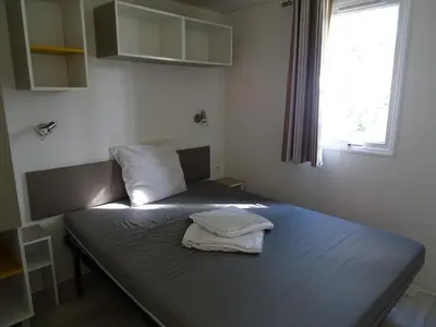 Un ou plusieurs lits dans un hébergement de l'établissement Camping Via Romana