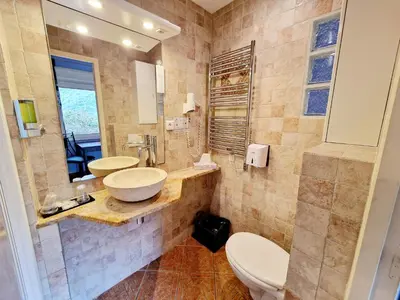 Salle de bains dans l'établissement Hôtel Bella Vista