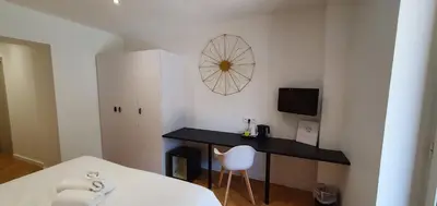 Télévision ou salle de divertissement dans l'établissement Hôtel Bella Vista