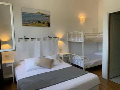 Un ou plusieurs lits dans un hébergement de l'établissement Hôtel U Pozzu