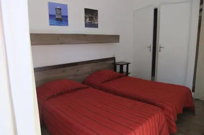 Un ou plusieurs lits dans un hébergement de l'établissement Hôtel U Pozzu