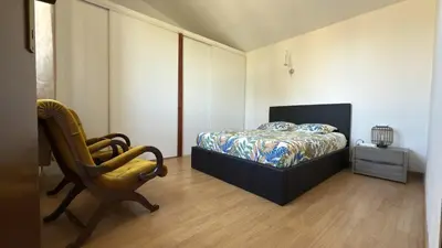 Un ou plusieurs lits dans un hébergement de l'établissement Appartement Maenat