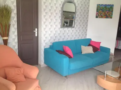 Coin salon dans l'établissement Apartement Alba Oletta