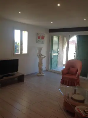 Télévision ou salle de divertissement dans l'établissement Apartement Alba Oletta
