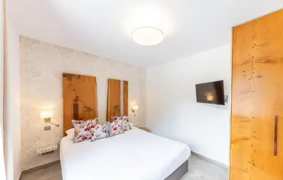 Un ou plusieurs lits dans un hébergement de l'établissement Hôtel de la Restonica
