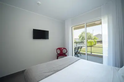 Télévision ou salle de divertissement dans l'établissement Residence Saletta Casale