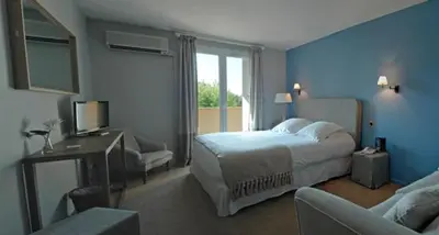 Un ou plusieurs lits dans un hébergement de l'établissement Hotel Santa Maria