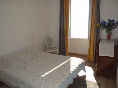 Un ou plusieurs lits dans un hébergement de l'établissement Appartement Colonella