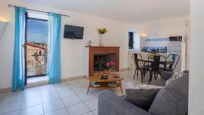 Télévision ou salle de divertissement dans l'établissement locations calenzana