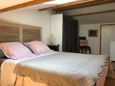 Un ou plusieurs lits dans un hébergement de l'établissement Studio Pinzali Avec Mezzanine